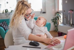 mother working from home with baby